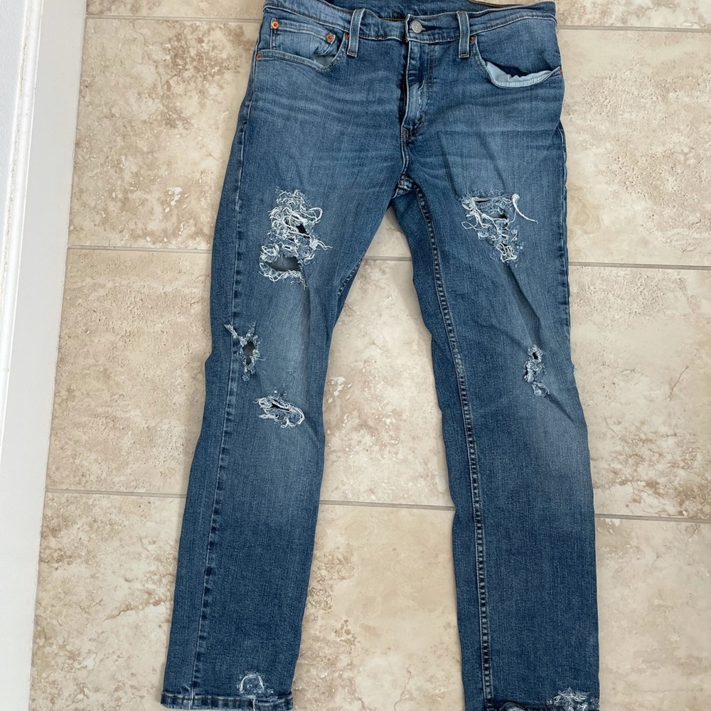 Levi’s 511 jeans distressed